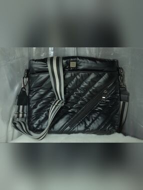 Black Quilted Crossbody Bag with Striped Strap